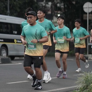 Race photo from BAUR RUN 2025
