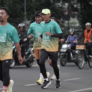 Race photo from BAUR RUN 2025