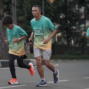 Race photo from BAUR RUN 2025