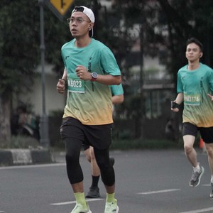 Race photo from BAUR RUN 2025