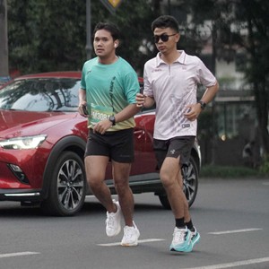 Race photo from BAUR RUN 2025