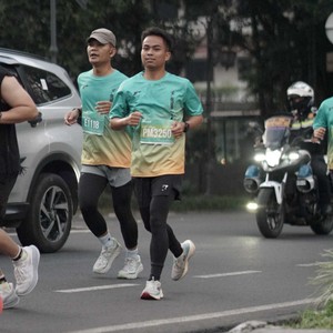 Race photo from BAUR RUN 2025