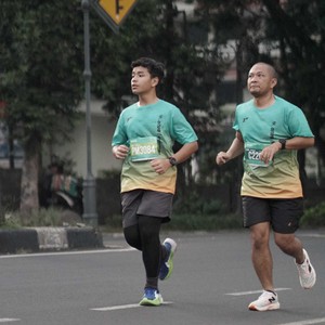 Race photo from BAUR RUN 2025