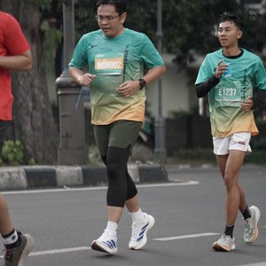 Race photo from BAUR RUN 2025