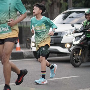 Race photo from BAUR RUN 2025