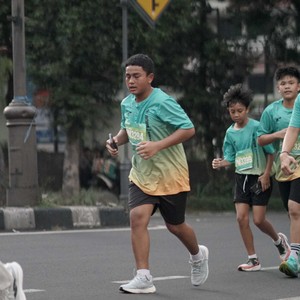 Race photo from BAUR RUN 2025