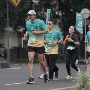 Race photo from BAUR RUN 2025