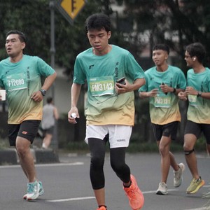 Race photo from BAUR RUN 2025