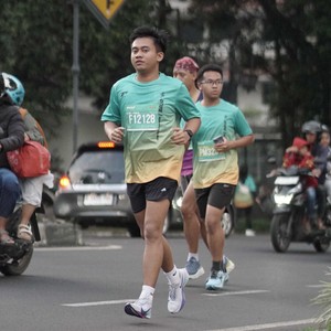 Race photo from BAUR RUN 2025
