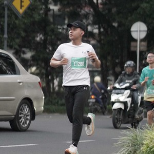 Race photo from BAUR RUN 2025