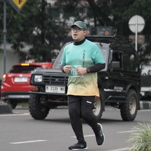 Race photo from BAUR RUN 2025