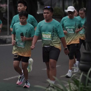 Race photo from BAUR RUN 2025