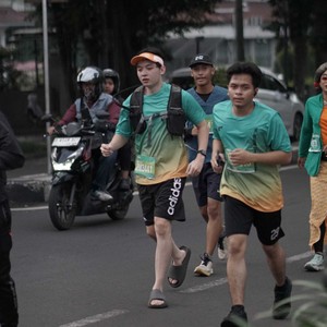 Race photo from BAUR RUN 2025