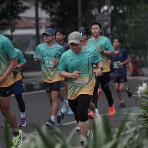 Race photo from BAUR RUN 2025
