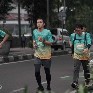 Race photo from BAUR RUN 2025