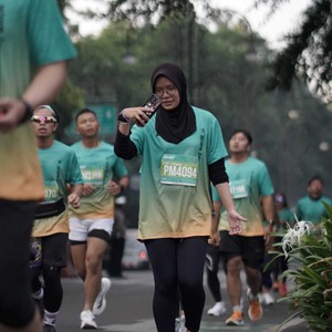 Race photo from BAUR RUN 2025