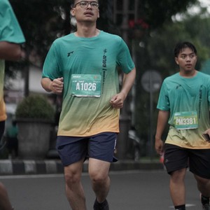 Race photo from BAUR RUN 2025
