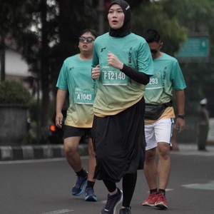 Race photo from BAUR RUN 2025