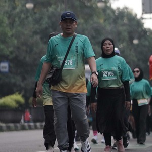 Race photo from BAUR RUN 2025