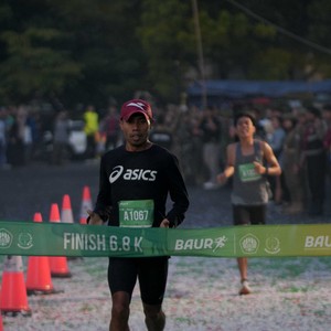 Race photo from BAUR RUN 2025