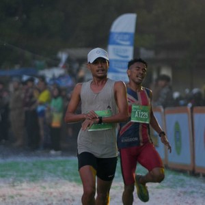 Race photo from BAUR RUN 2025