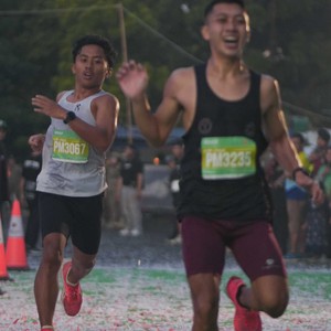 Race photo from BAUR RUN 2025