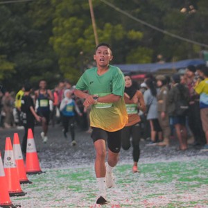 Race photo from BAUR RUN 2025