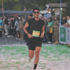 Race photo from BAUR RUN 2025