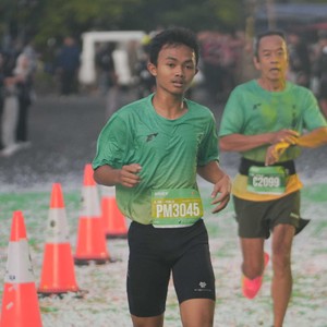 Race photo from BAUR RUN 2025
