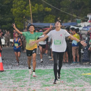 Race photo from BAUR RUN 2025