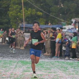 Race photo from BAUR RUN 2025