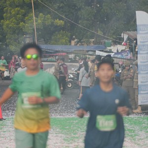 Race photo from BAUR RUN 2025
