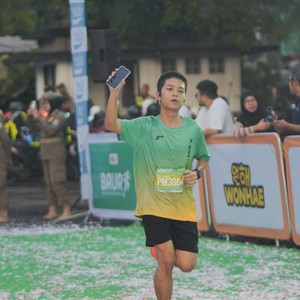 Race photo from BAUR RUN 2025