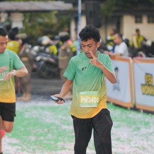 Race photo from BAUR RUN 2025
