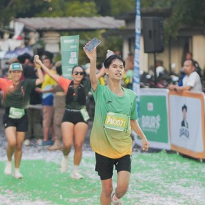 Race photo from BAUR RUN 2025