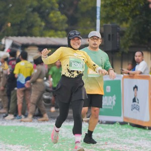 Race photo from BAUR RUN 2025