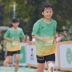Race photo from BAUR RUN 2025