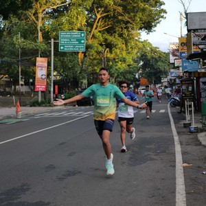 Race photo from BAUR RUN 2025