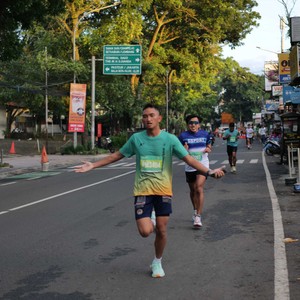 Race photo from BAUR RUN 2025