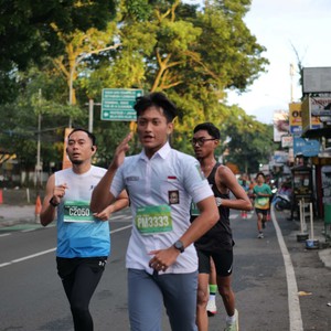 Race photo from BAUR RUN 2025