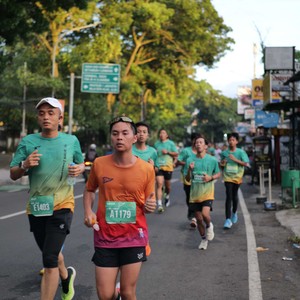 Race photo from BAUR RUN 2025