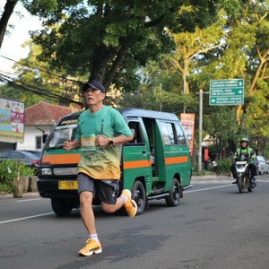 Race photo from BAUR RUN 2025