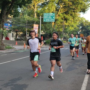 Race photo from BAUR RUN 2025