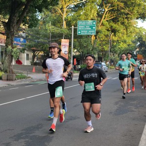 Race photo from BAUR RUN 2025