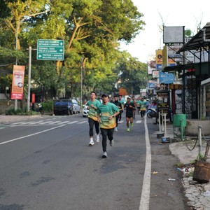 Race photo from BAUR RUN 2025