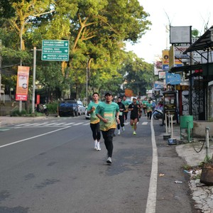 Race photo from BAUR RUN 2025