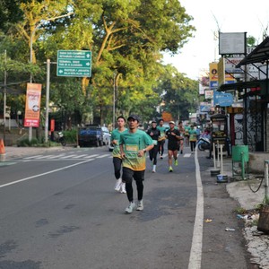 Race photo from BAUR RUN 2025