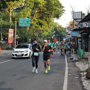 Race photo from BAUR RUN 2025