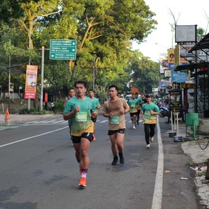 Race photo from BAUR RUN 2025