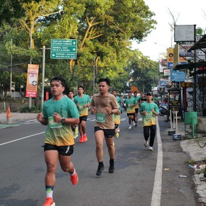 Race photo from BAUR RUN 2025